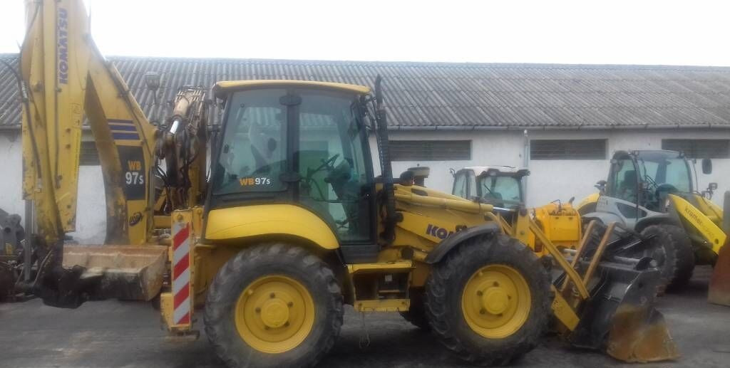 Komatsu WB 97 S - Ekskavators-iekrāvējs: foto 1 Komatsu WB 97 S - Ekskavators-iekrāvējs: foto 1