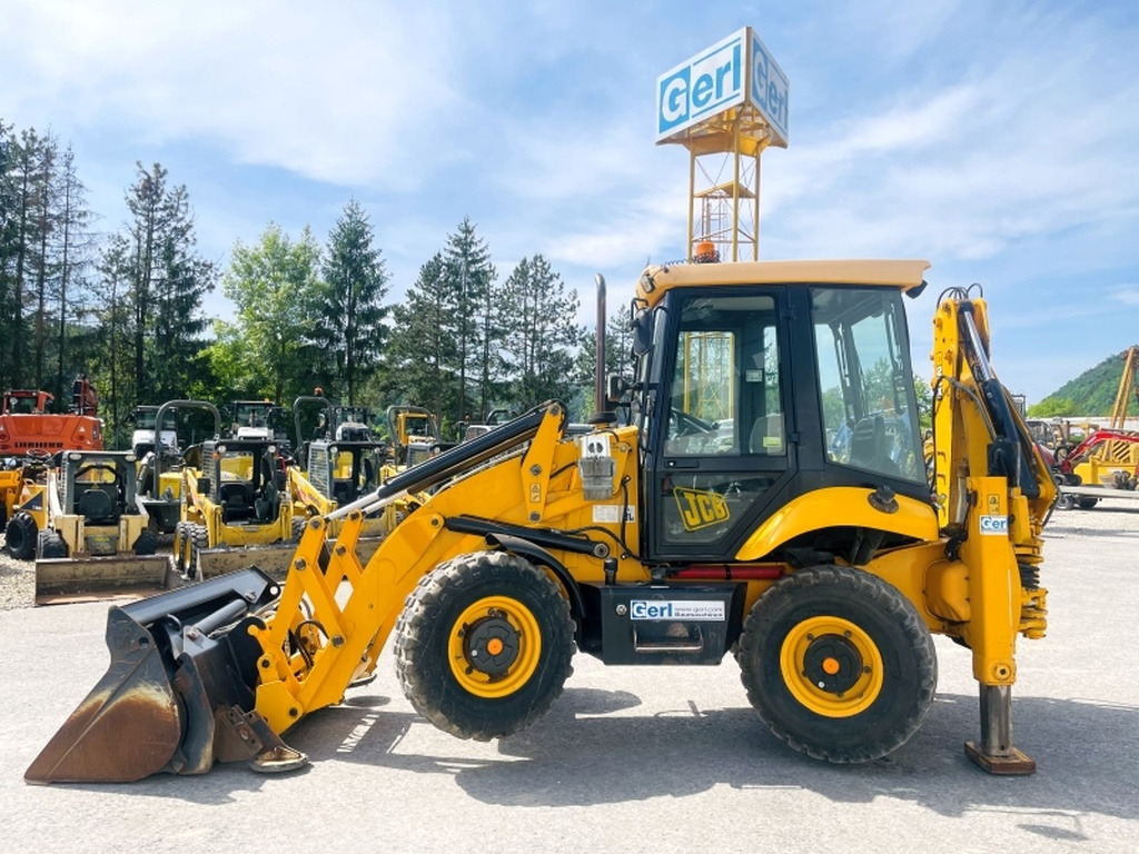 JCB 2CX SM 4WS (4003) - Ekskavators-iekrāvējs: foto 1 JCB 2CX SM 4WS (4003) - Ekskavators-iekrāvējs: foto 1