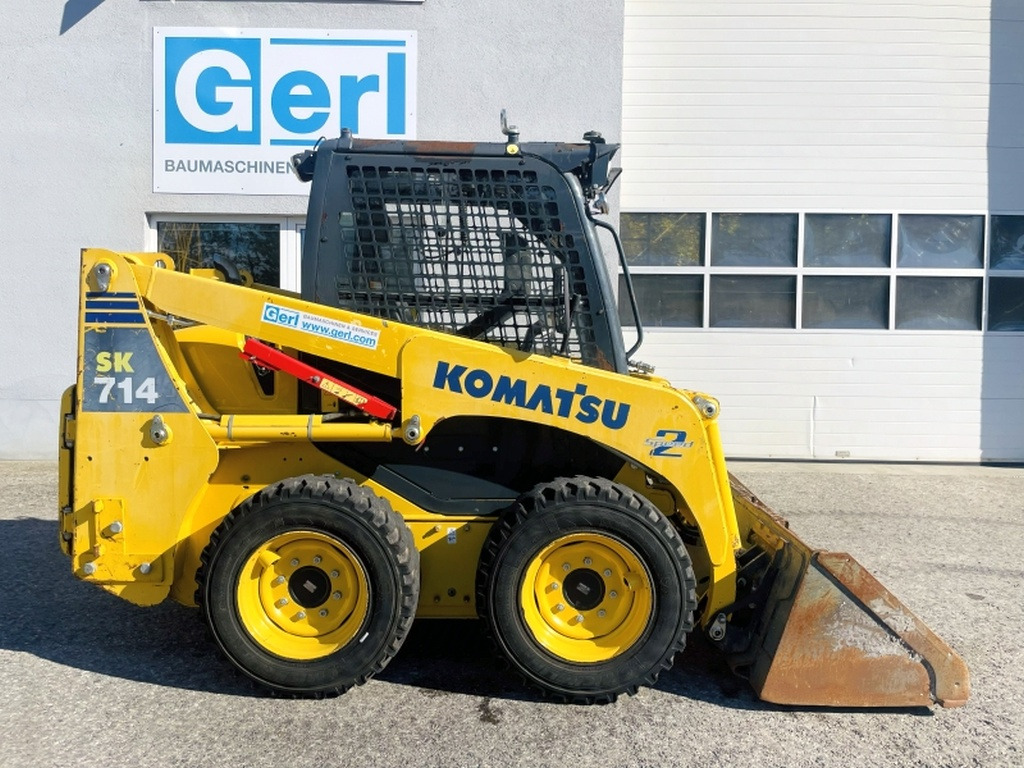 Komatsu SK714 (4077) - Kompaktiekrāvējs: foto 2 Komatsu SK714 (4077) - Kompaktiekrāvējs: foto 2