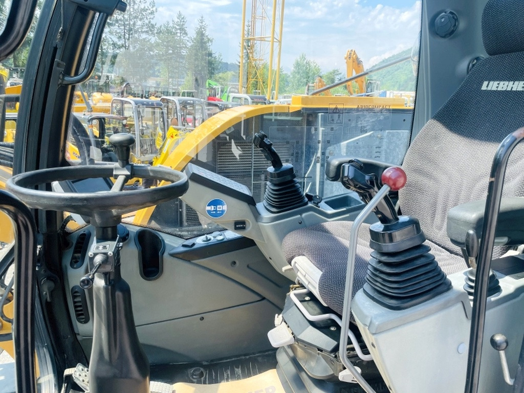 Liebherr A910 Compact (4025) - Riteņu ekskavators: foto 5 Liebherr A910 Compact (4025) - Riteņu ekskavators: foto 5