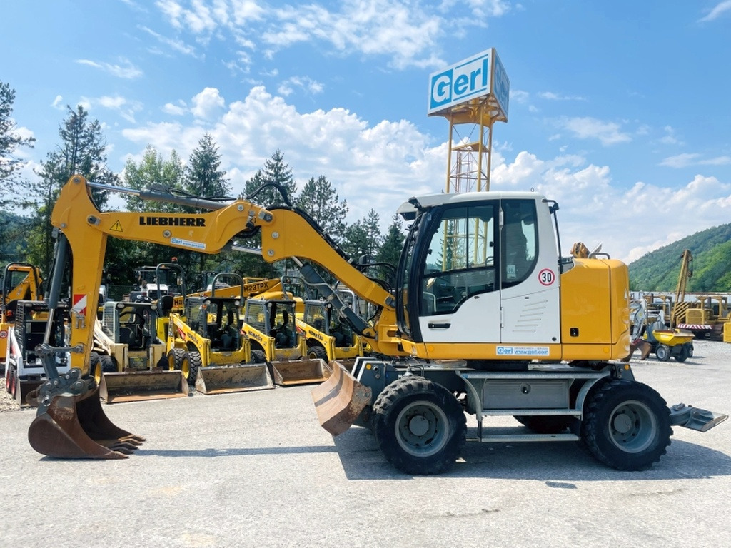 Liebherr A910 Compact (4025) - Riteņu ekskavators: foto 1 Liebherr A910 Compact (4025) - Riteņu ekskavators: foto 1