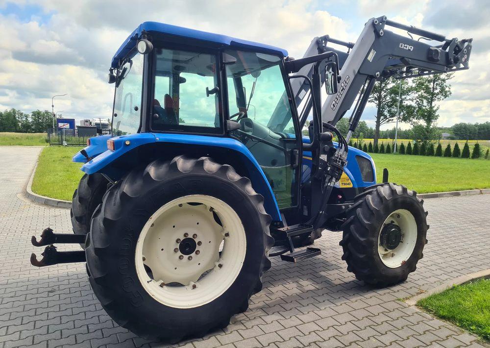 New Holland T5040 - Traktors: foto 4 New Holland T5040 - Traktors: foto 4