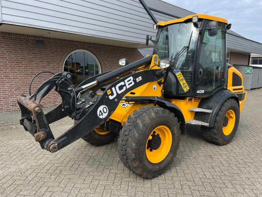 JCB 409 Agri shovel - Riteņu iekrāvējs: foto 1 JCB 409 Agri shovel - Riteņu iekrāvējs: foto 1