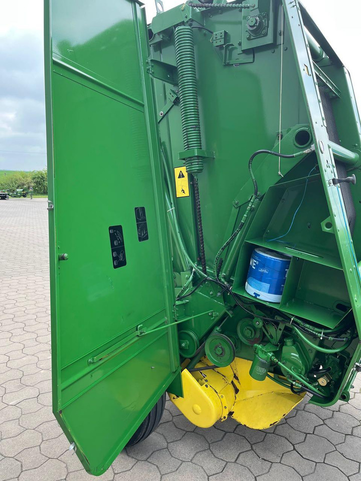 Rituļu prese John Deere 550: foto 6