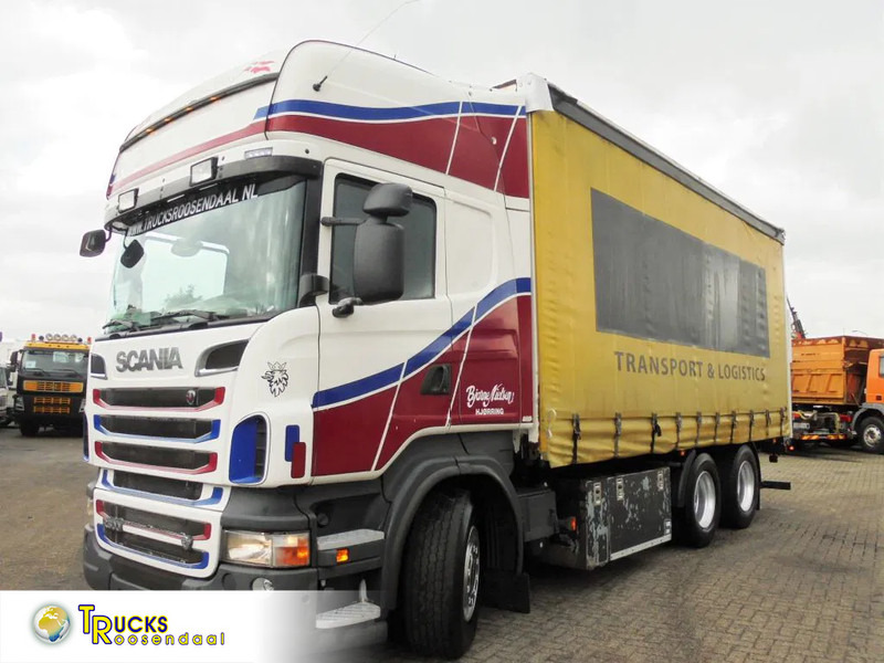 Scania R500 V8 + Euro 5 + Retarder + Lift + 6x2 - Kravas automašīna ar tentu: foto 1 Scania R500 V8 + Euro 5 + Retarder + Lift + 6x2 - Kravas automašīna ar tentu: foto 1