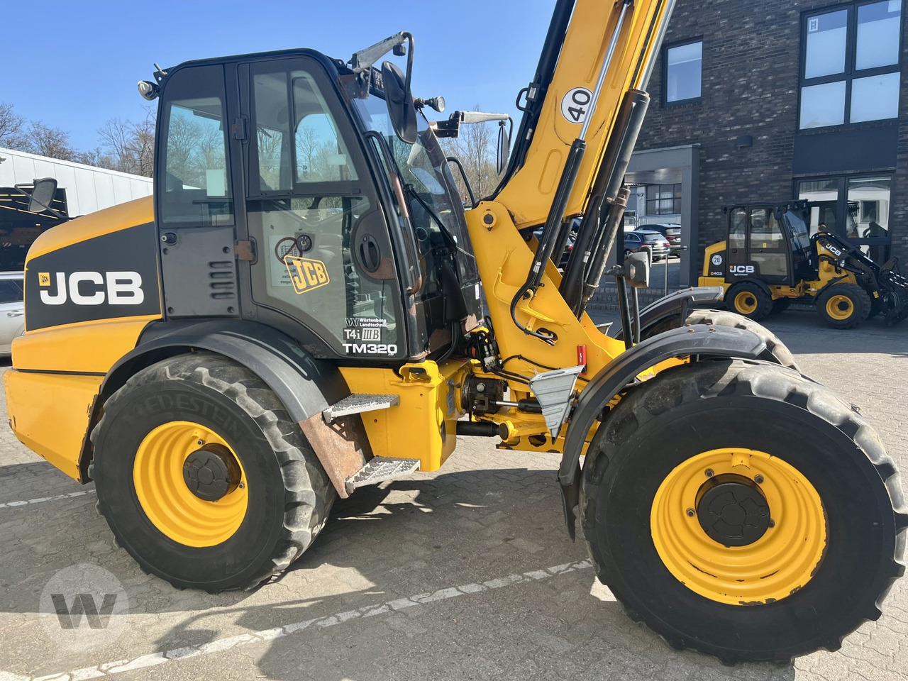 Riteņu iekrāvējs JCB TM 320 S: foto 7