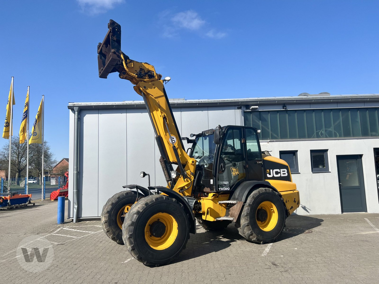 Riteņu iekrāvējs JCB TM 320 S: foto 8