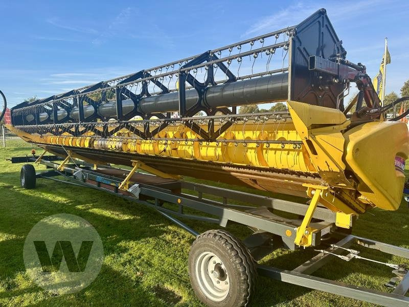 New Holland Schneidwerk 10,70 m - Labības heders: foto 3 New Holland Schneidwerk 10,70 m - Labības heders: foto 3