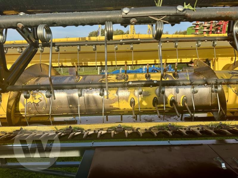 New Holland Schneidwerk 10,70 m - Labības heders: foto 5 New Holland Schneidwerk 10,70 m - Labības heders: foto 5