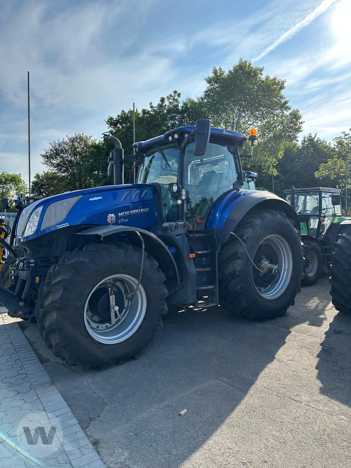 New Holland T 7.315 HD Stage V - Traktors: foto 1 New Holland T 7.315 HD Stage V - Traktors: foto 1