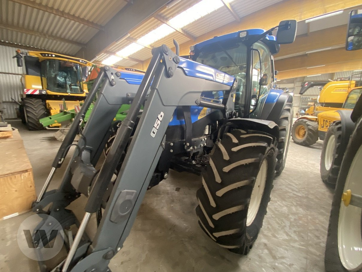 New Holland T6020 Elite - Traktors: foto 1 New Holland T6020 Elite - Traktors: foto 1