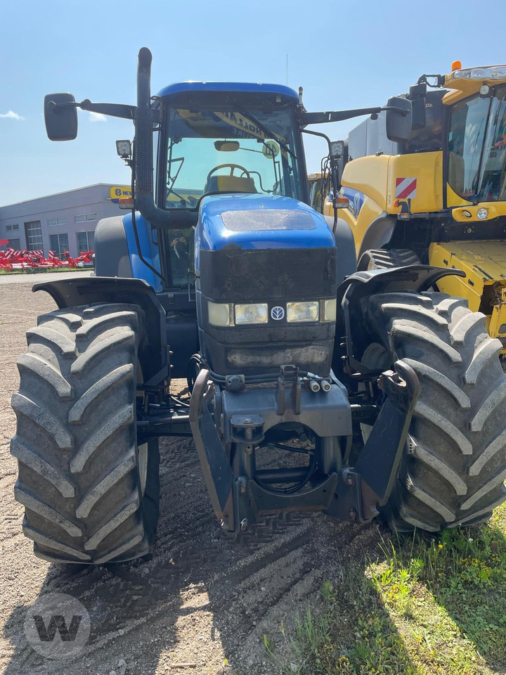 New Holland TM 190 - Traktors: foto 1 New Holland TM 190 - Traktors: foto 1