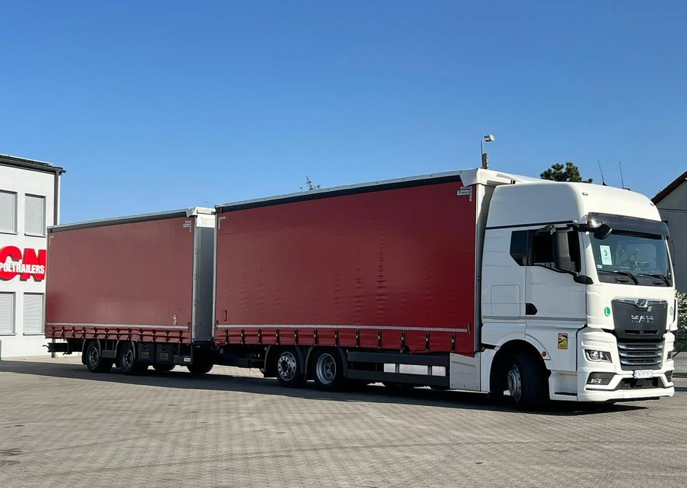MAN TGX 26.470 z przyczepą Redos - Kravas automašīna ar tentu: foto 2 MAN TGX 26.470 z przyczepą Redos - Kravas automašīna ar tentu: foto 2