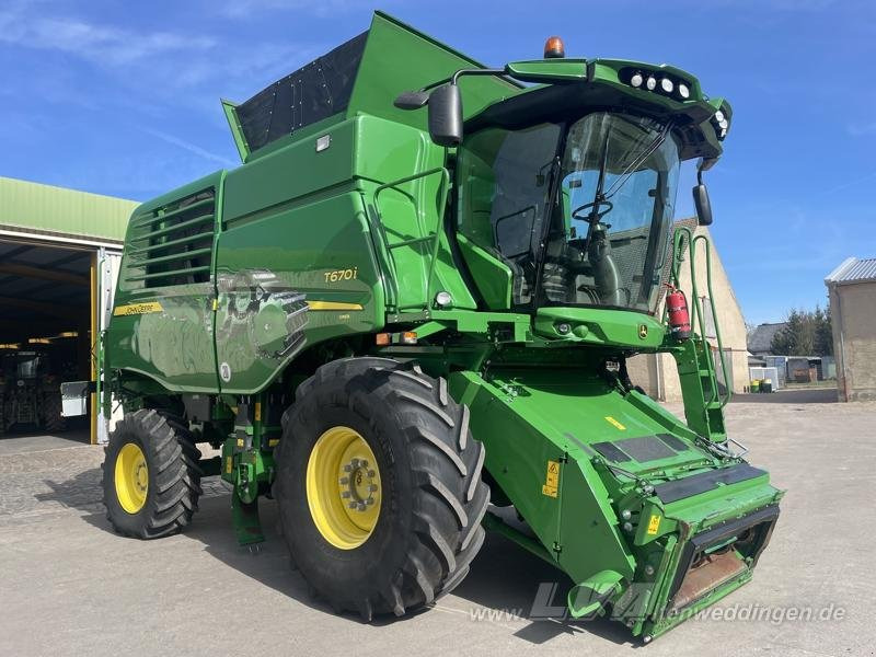 John Deere T670 i - Labības kombains: foto 1 John Deere T670 i - Labības kombains: foto 1