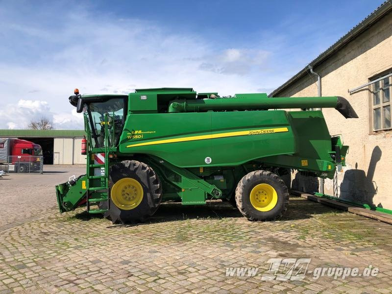John Deere W550 - Labības kombains: foto 1 John Deere W550 - Labības kombains: foto 1
