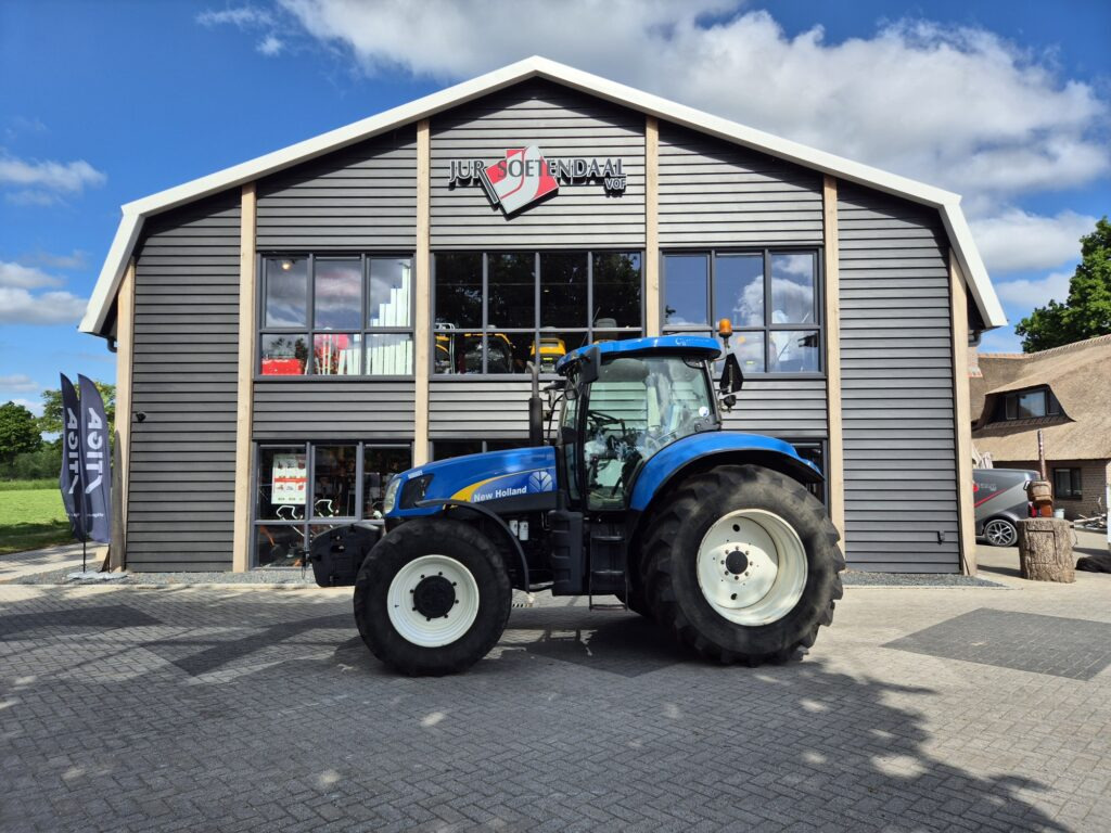NEW HOLLAND T6080 - Traktors: foto 1 NEW HOLLAND T6080 - Traktors: foto 1