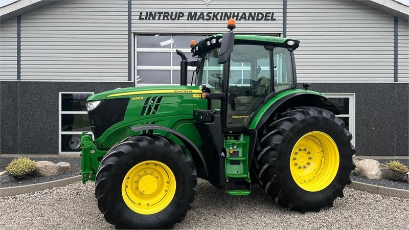 John Deere 6195R Premium Edition med frontlift - Traktors: foto 1 John Deere 6195R Premium Edition med frontlift - Traktors: foto 1