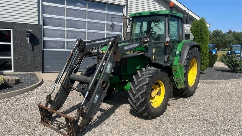John Deere 6510 Med frontlæsser - Traktors: foto 2 John Deere 6510 Med frontlæsser - Traktors: foto 2