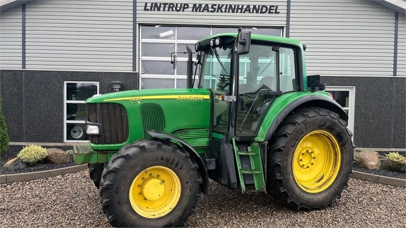 John Deere 6620 TLS PowerQuad - Traktors: foto 1 John Deere 6620 TLS PowerQuad - Traktors: foto 1