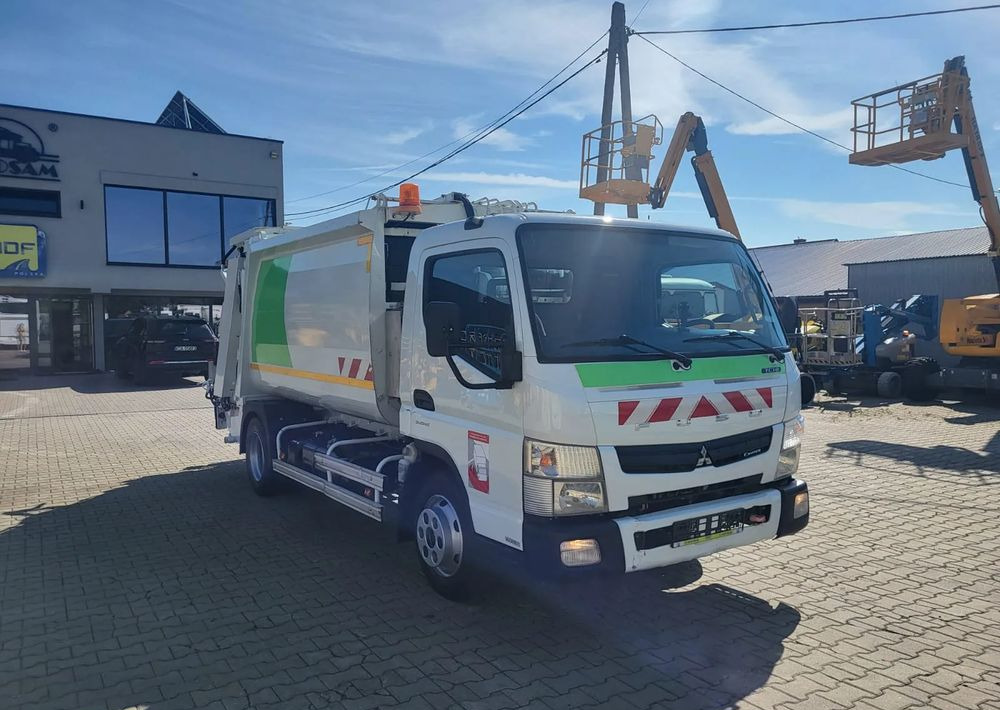 Mitsubishi Fuso Canter - Atkritumu vedējs: foto 2 Mitsubishi Fuso Canter - Atkritumu vedējs: foto 2
