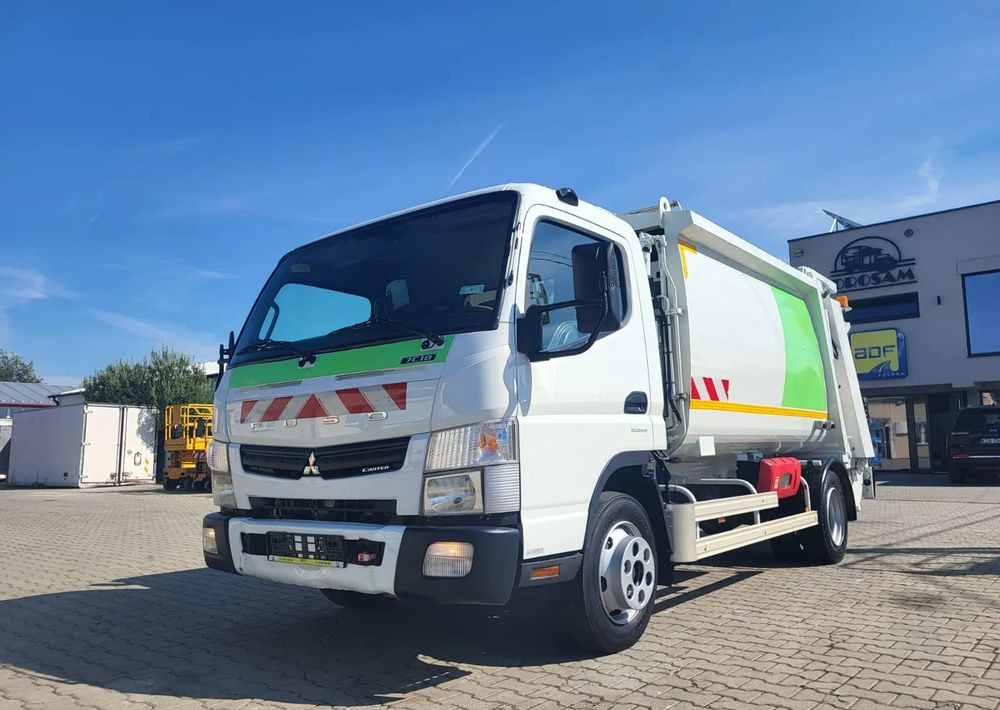 Mitsubishi Fuso Canter - Atkritumu vedējs: foto 1 Mitsubishi Fuso Canter - Atkritumu vedējs: foto 1