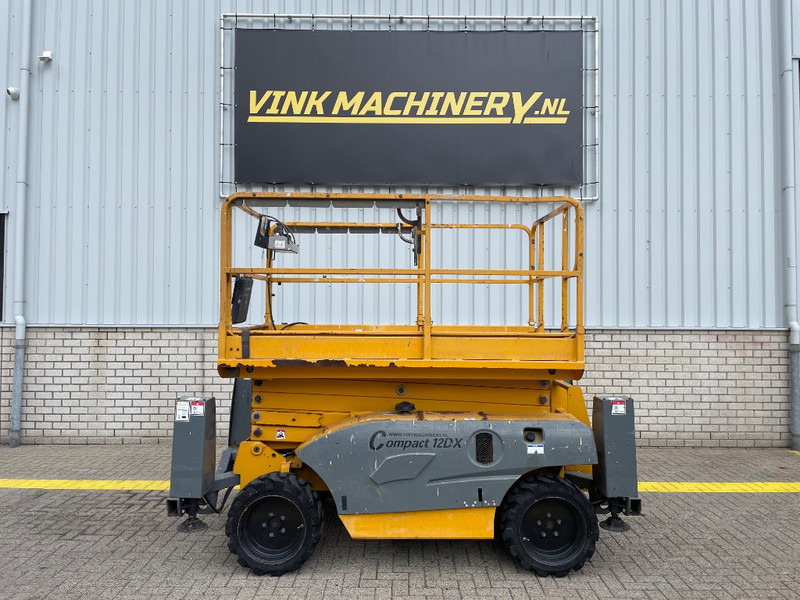 Haulotte Compact 12 DX - Šķērveida pacēlājs: foto 1 Haulotte Compact 12 DX - Šķērveida pacēlājs: foto 1