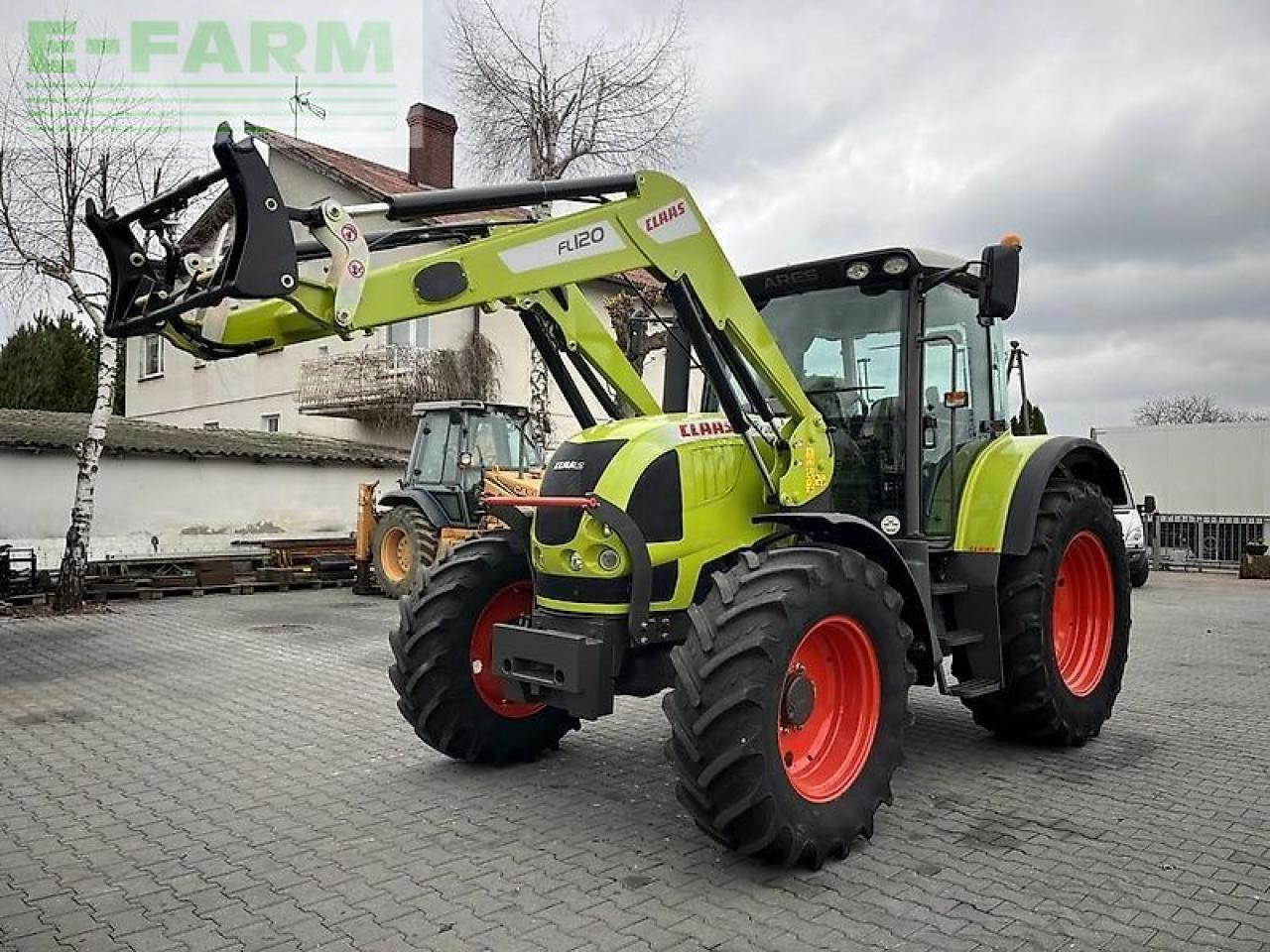 CLAAS ares 617 atz + claas fl120 ATZ - Traktors: foto 1 CLAAS ares 617 atz + claas fl120 ATZ - Traktors: foto 1