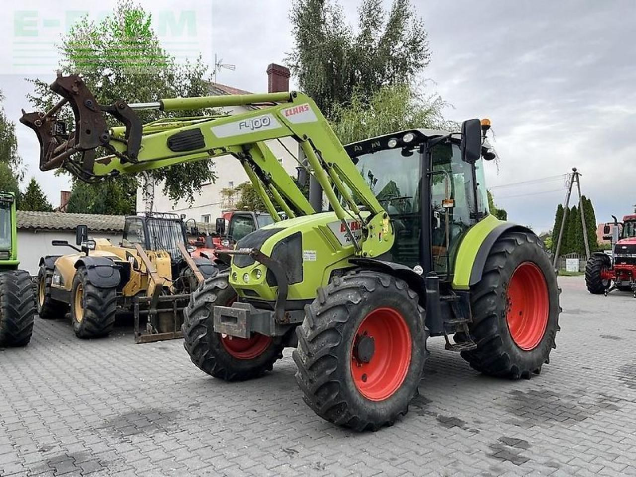 CLAAS arion 420 cis + claas fl100 - Traktors: foto 1 CLAAS arion 420 cis + claas fl100 - Traktors: foto 1