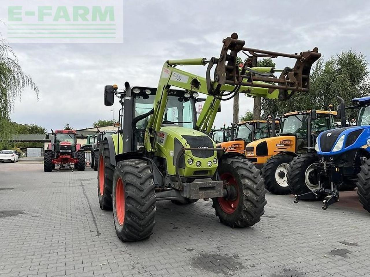 CLAAS arion 420 cis + claas fl100 - Traktors: foto 3 CLAAS arion 420 cis + claas fl100 - Traktors: foto 3