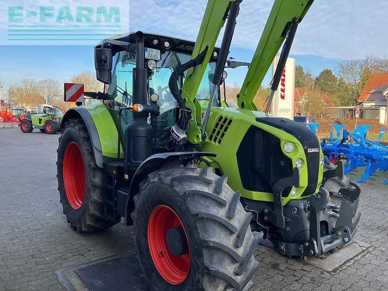 CLAAS arion 650 cis + fl140 + maxi-care - Traktors: foto 4 CLAAS arion 650 cis + fl140 + maxi-care - Traktors: foto 4