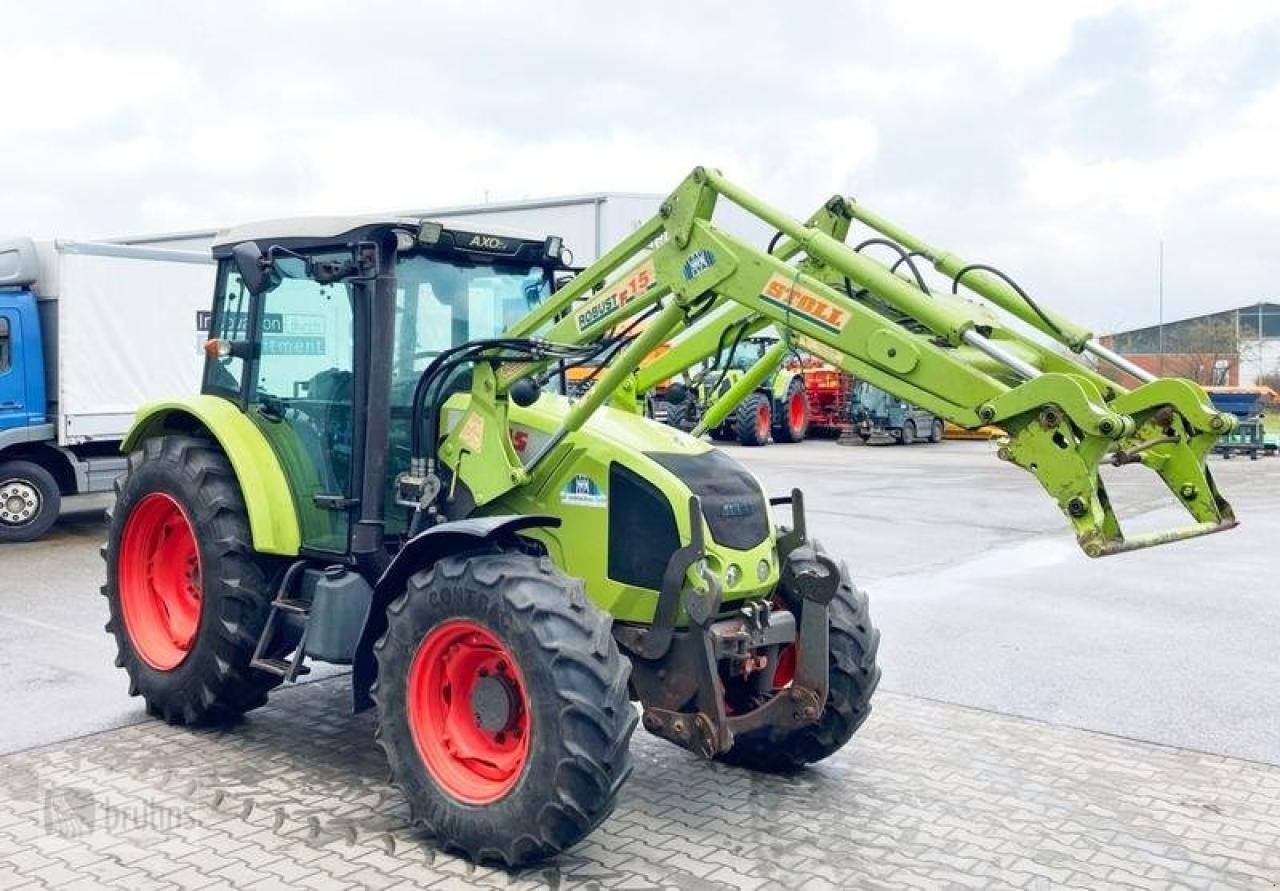 CLAAS axos 320 mit stoll frontlader - Traktors: foto 1 CLAAS axos 320 mit stoll frontlader - Traktors: foto 1