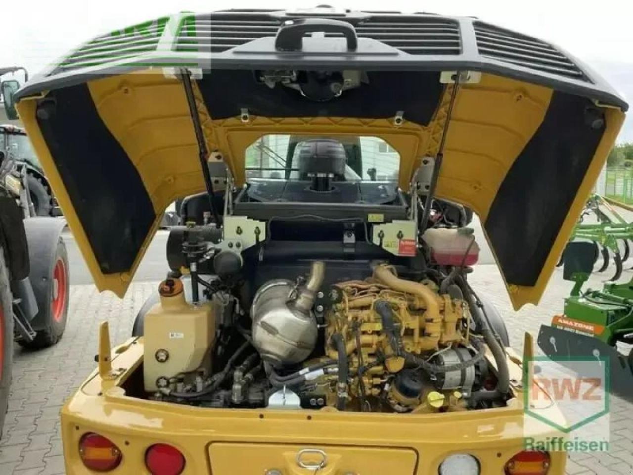 Mini-ekskavators Caterpillar 906 radlader: foto 9