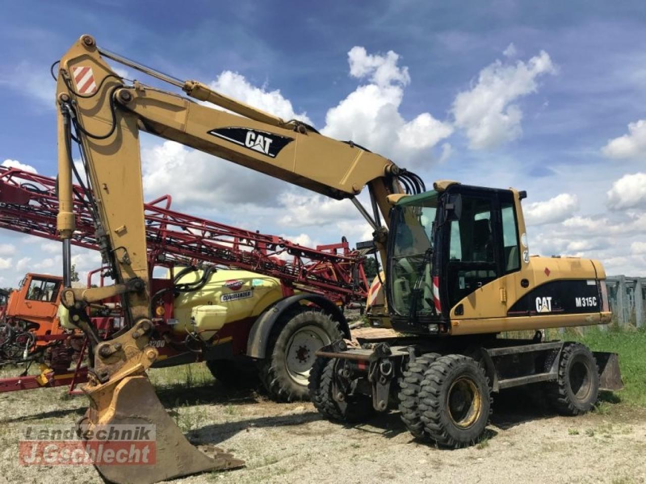 Caterpillar m 315c - Riteņu ekskavators: foto 1 Caterpillar m 315c - Riteņu ekskavators: foto 1