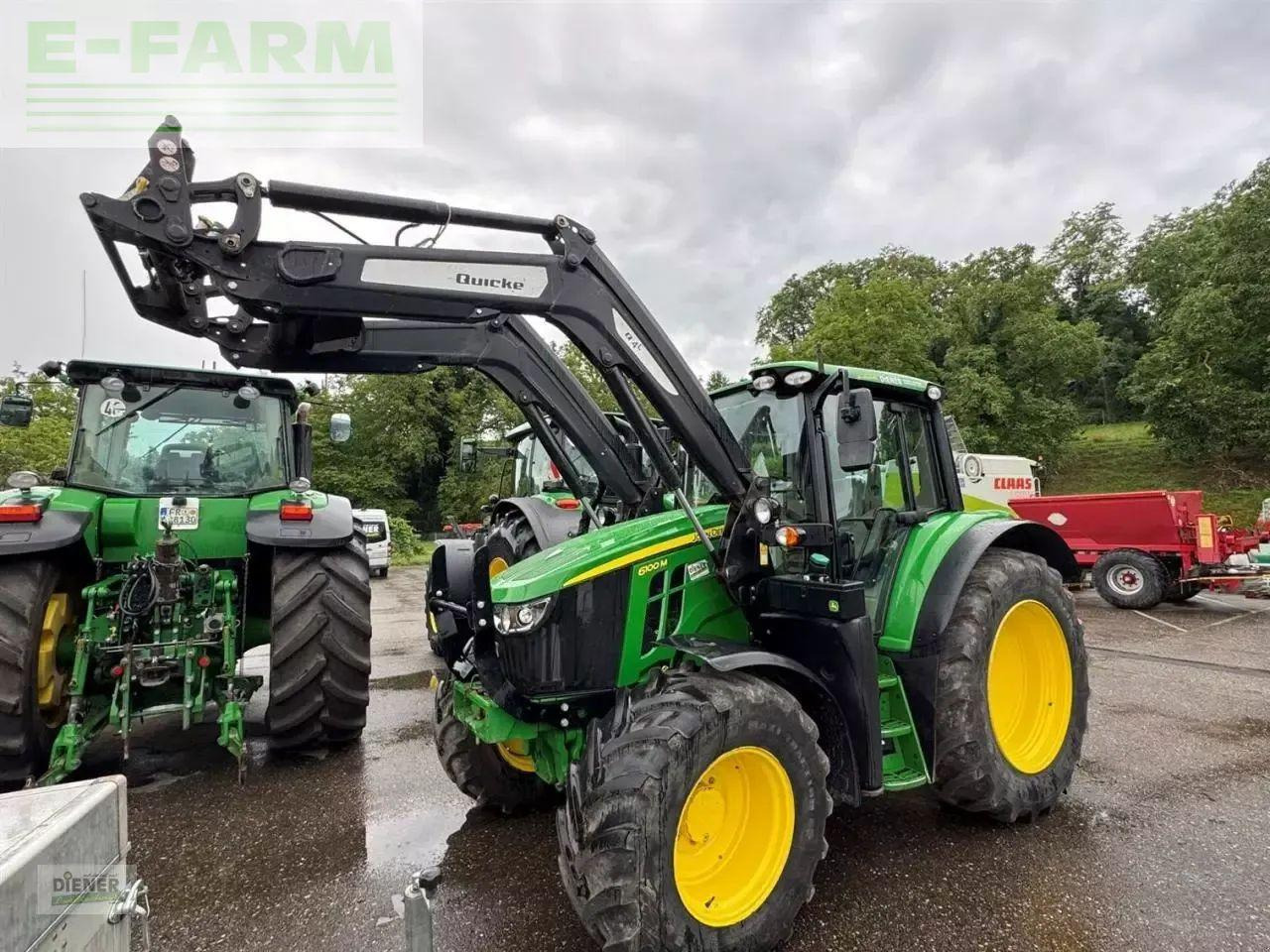 John Deere 6100m - Traktors: foto 1 John Deere 6100m - Traktors: foto 1