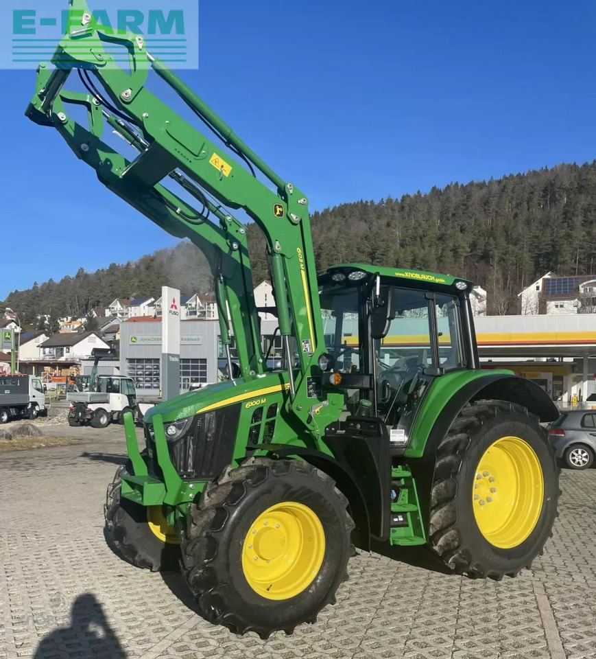 John Deere 6100m - Traktors: foto 1 John Deere 6100m - Traktors: foto 1