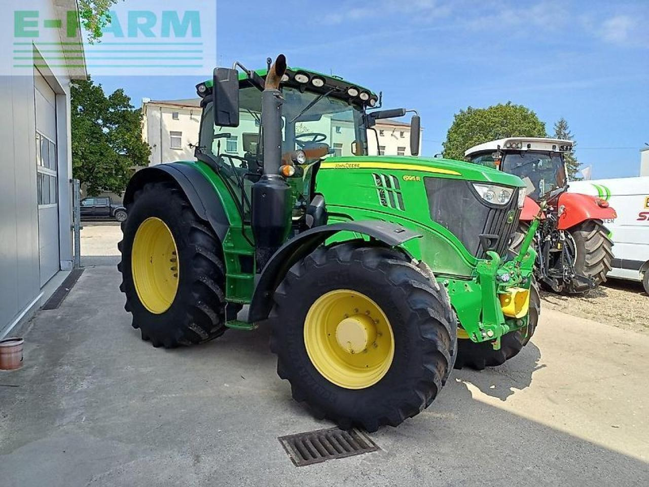 John Deere 6195r - Traktors: foto 1 John Deere 6195r - Traktors: foto 1
