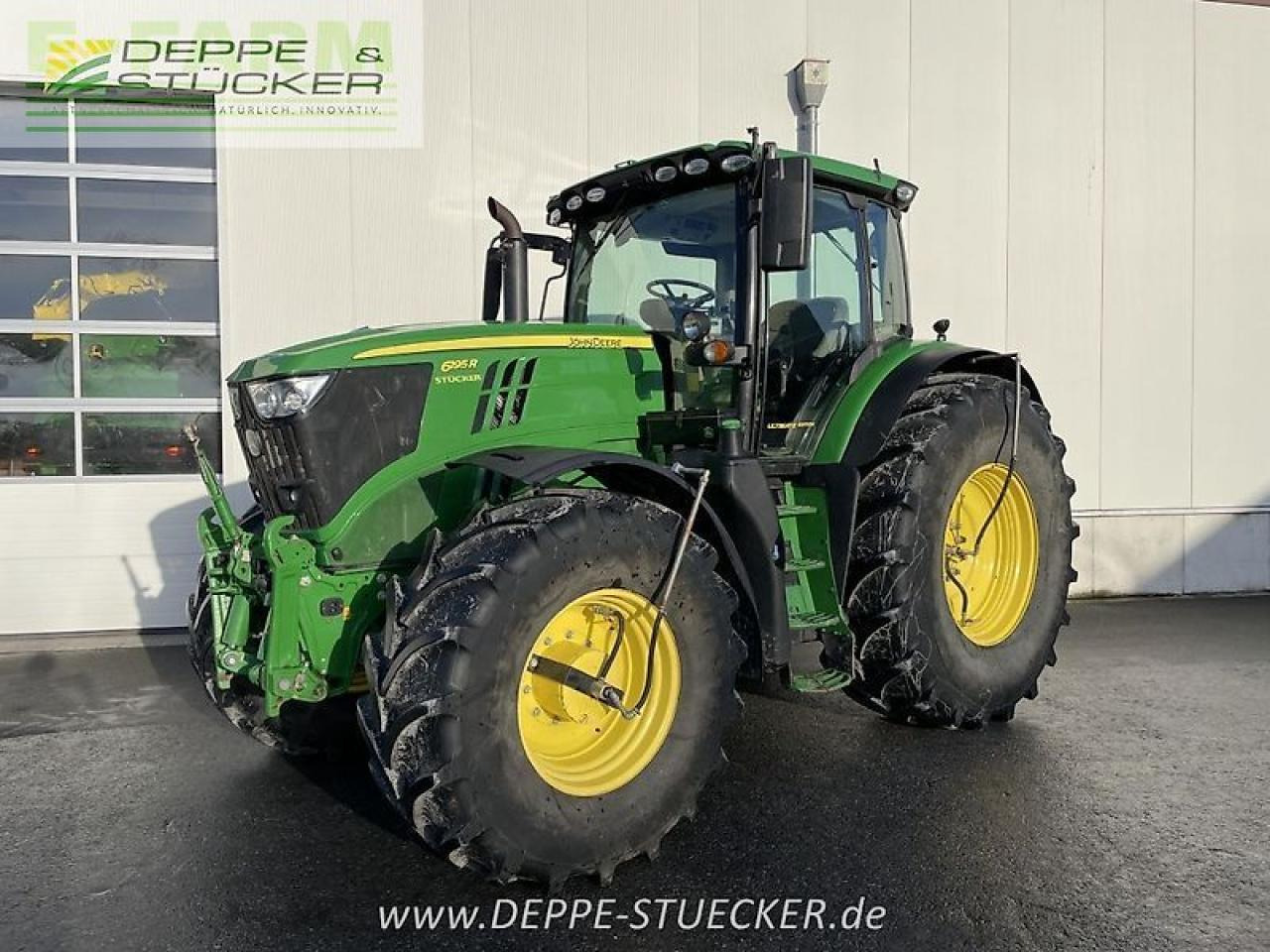 John Deere 6195r - Traktors: foto 1 John Deere 6195r - Traktors: foto 1