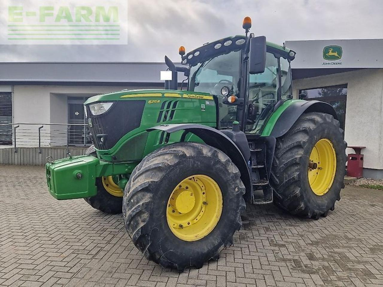 John Deere 6215r - Traktors: foto 1 John Deere 6215r - Traktors: foto 1