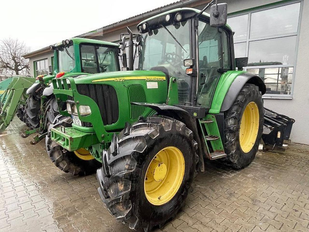 John Deere 6420 premium - Traktors: foto 1 John Deere 6420 premium - Traktors: foto 1