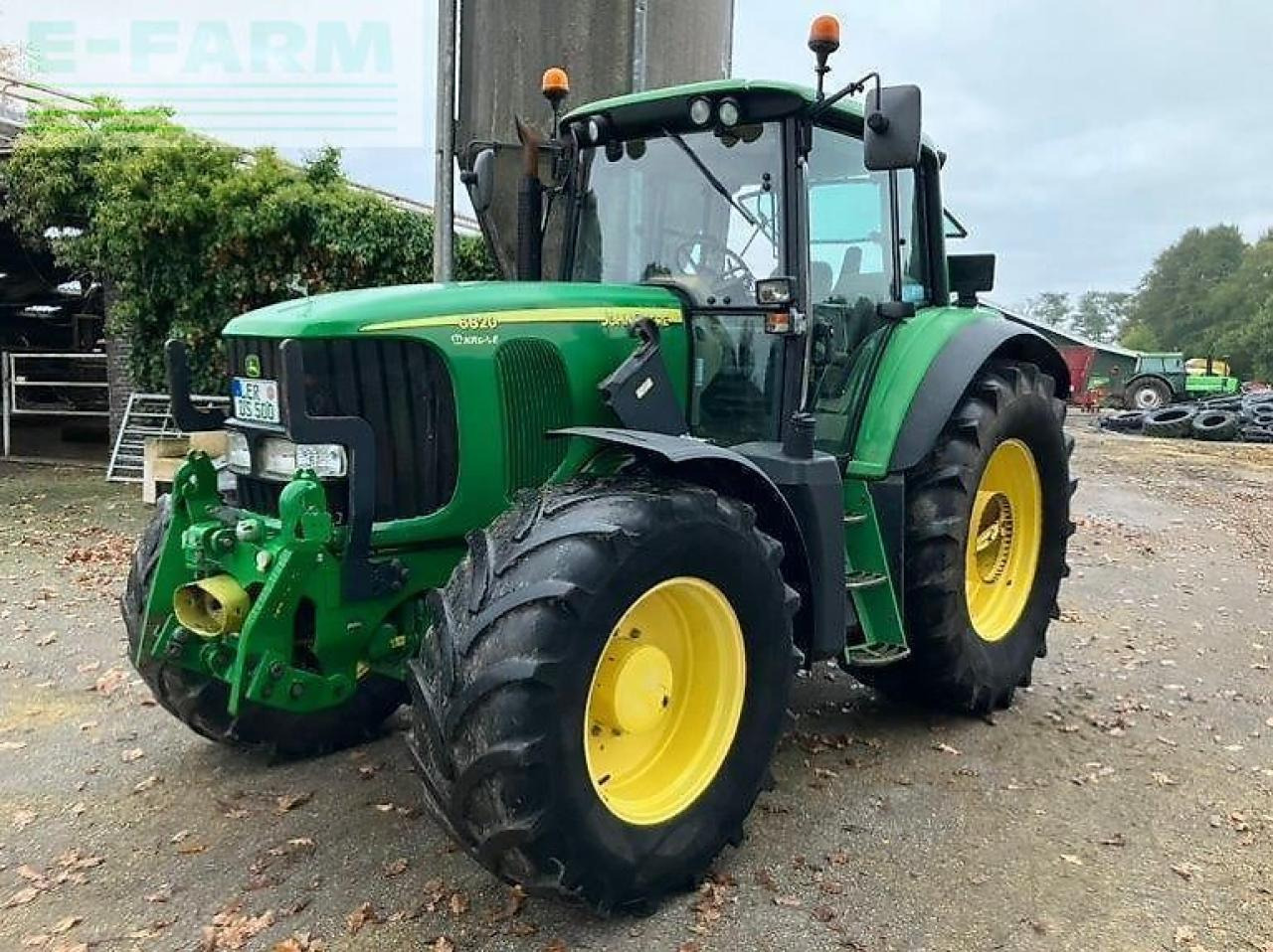 John Deere 6820 premium - Traktors: foto 1 John Deere 6820 premium - Traktors: foto 1