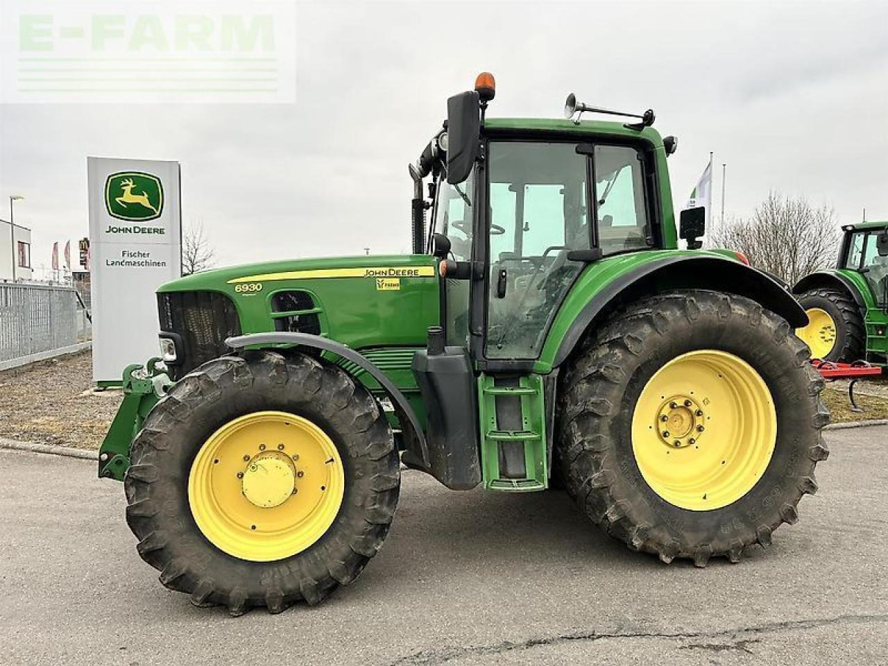 John Deere 6930 premium ap - Traktors: foto 1 John Deere 6930 premium ap - Traktors: foto 1