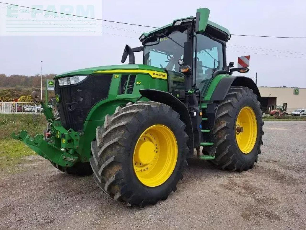 John Deere 7r 310 - Traktors: foto 1 John Deere 7r 310 - Traktors: foto 1