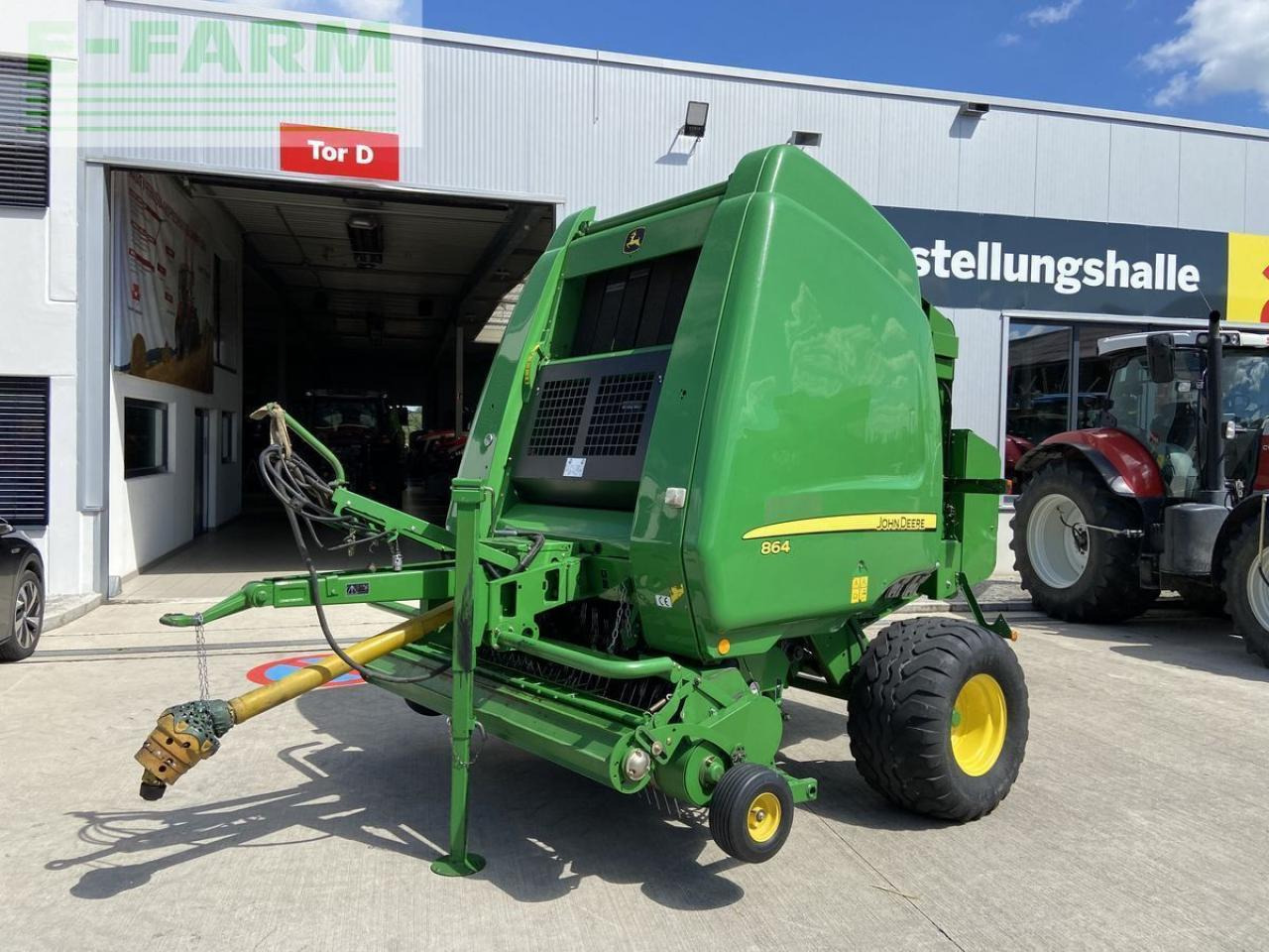 John Deere 864 - Kīpu prese: foto 1 John Deere 864 - Kīpu prese: foto 1