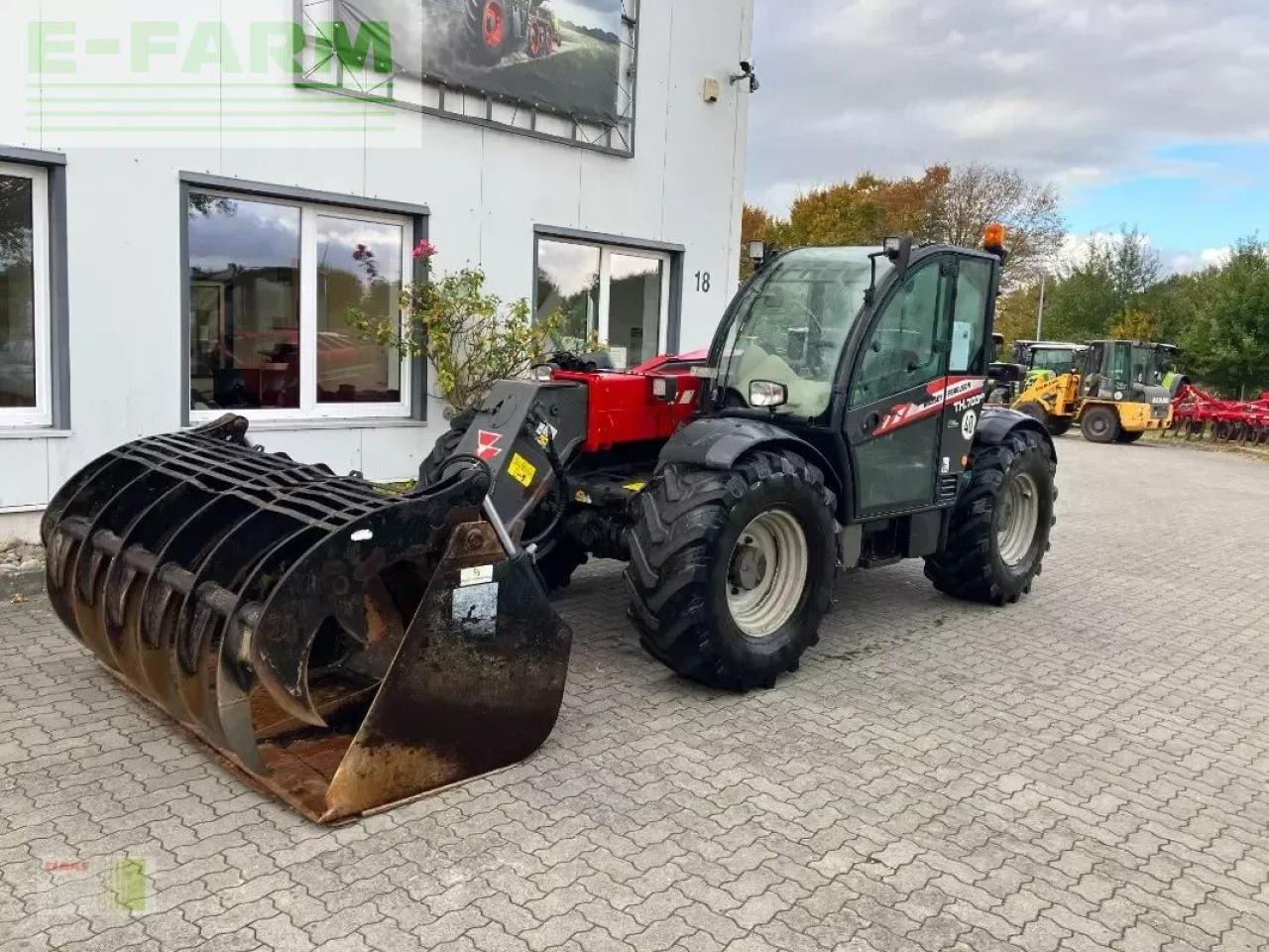 Massey Ferguson th. 7038 - Teleskopiskais iekrāvējs: foto 1 Massey Ferguson th. 7038 - Teleskopiskais iekrāvējs: foto 1