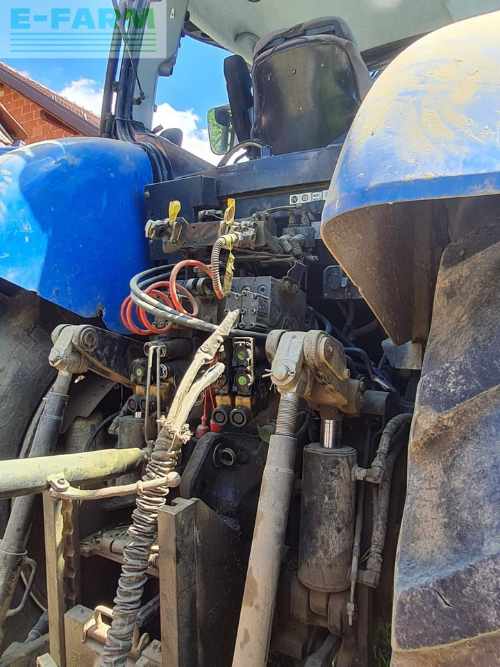 New Holland T7050 - Traktors: foto 2 New Holland T7050 - Traktors: foto 2