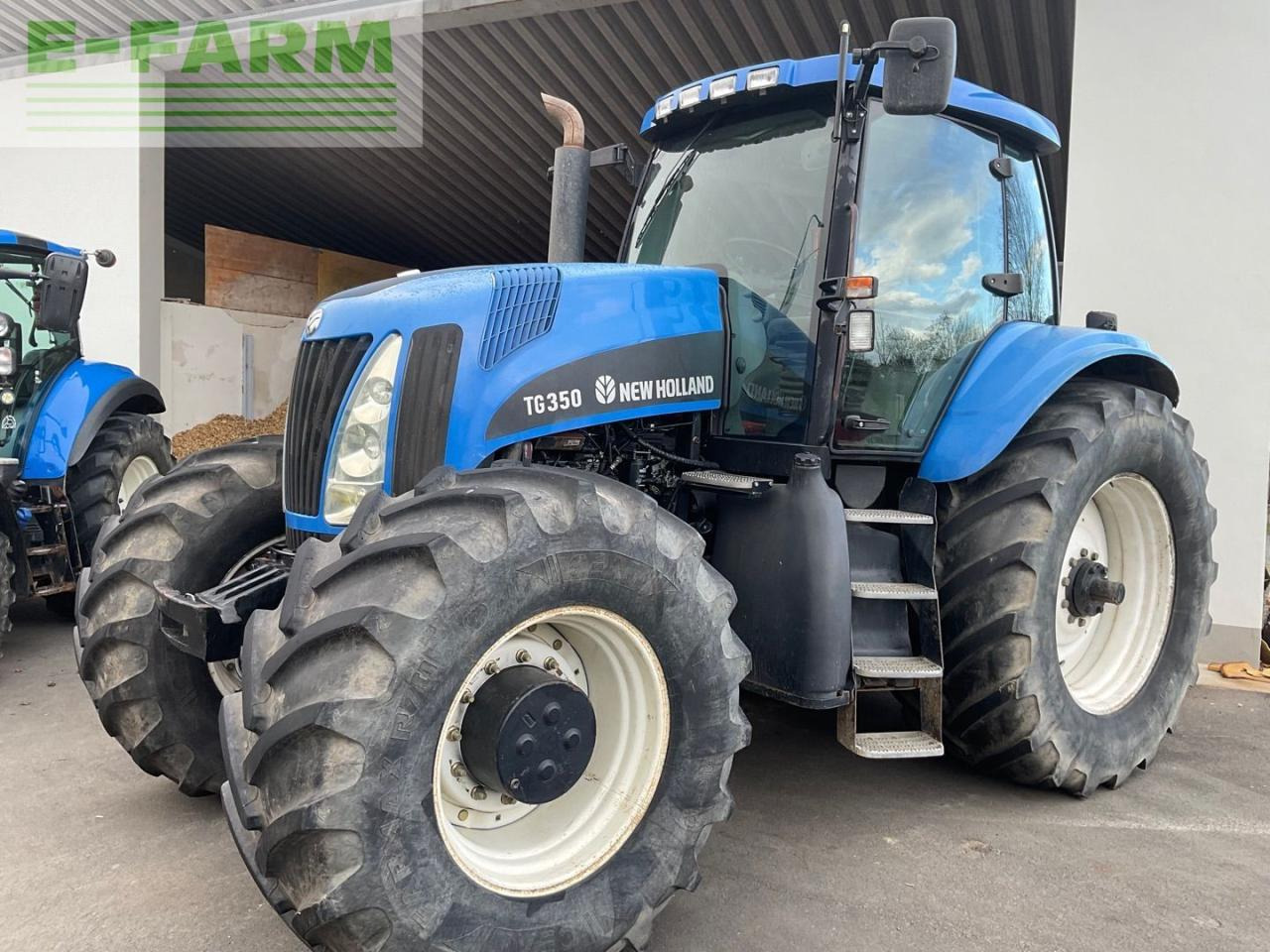 New Holland TG 285 - Traktors: foto 1 New Holland TG 285 - Traktors: foto 1