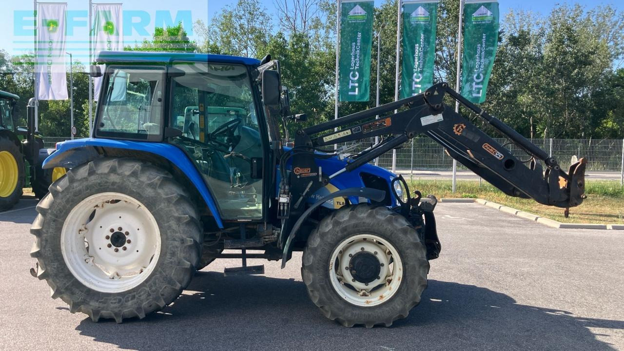 New Holland TL 80 A A - Traktors: foto 5 New Holland TL 80 A A - Traktors: foto 5