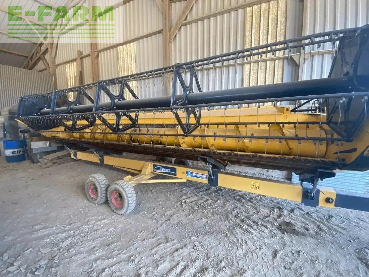 New Holland cx 6090 std - Labības kombains: foto 3 New Holland cx 6090 std - Labības kombains: foto 3