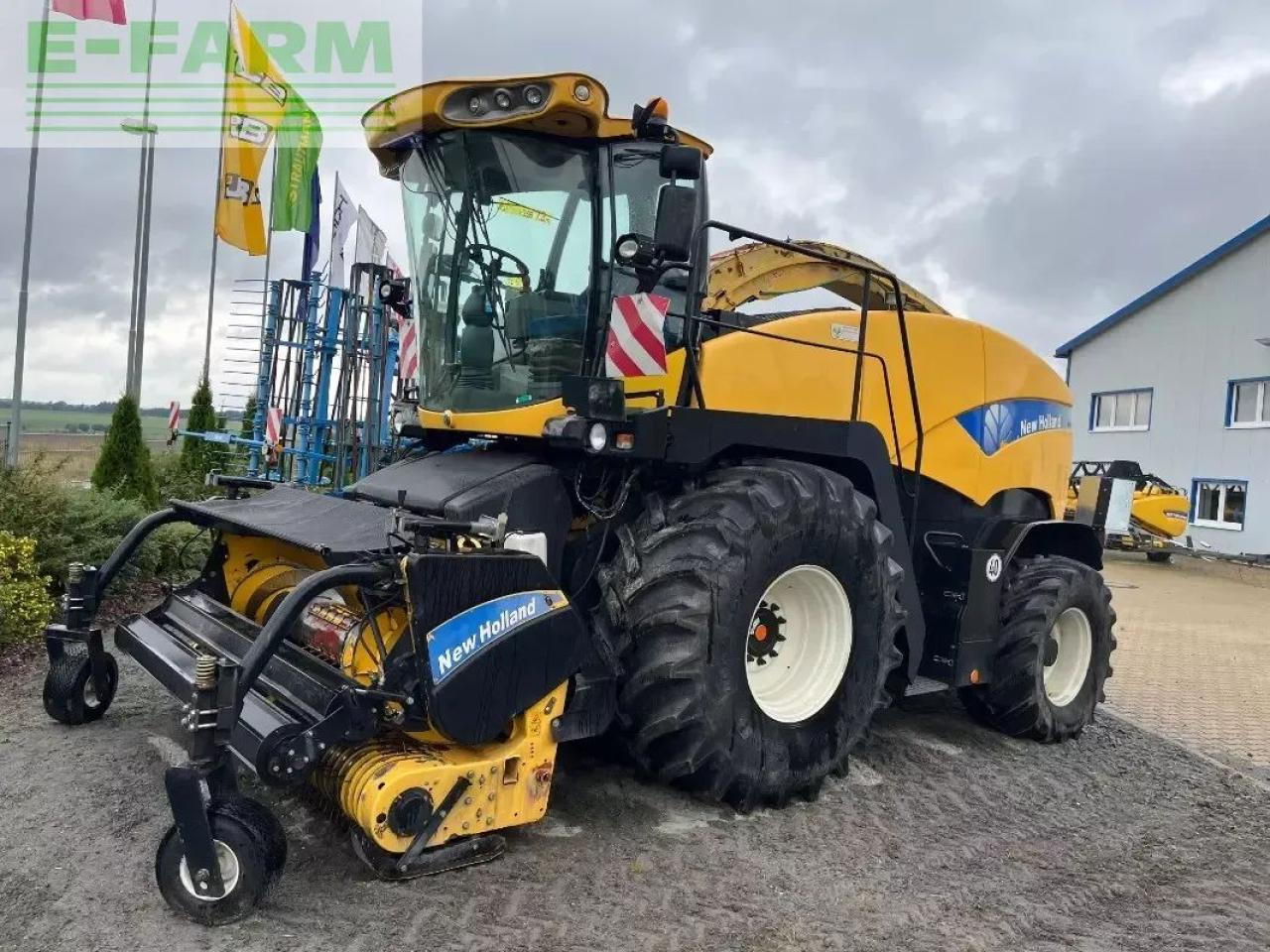 New Holland fr 9050 - Lopbarības kombains: foto 1 New Holland fr 9050 - Lopbarības kombains: foto 1