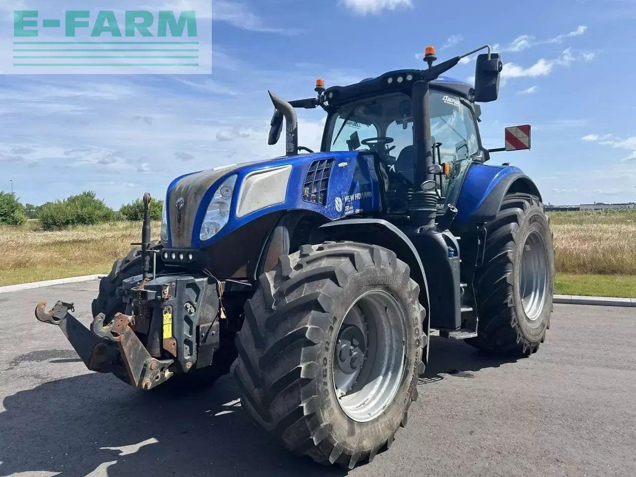 New Holland nh t 8.410 - Traktors: foto 1 New Holland nh t 8.410 - Traktors: foto 1